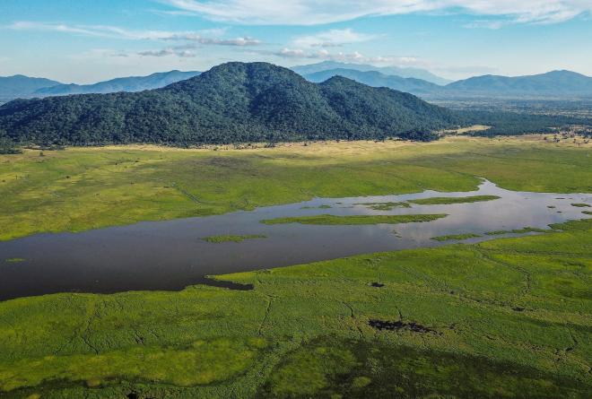 Aerial view of Malawi wetland with hills in the background
